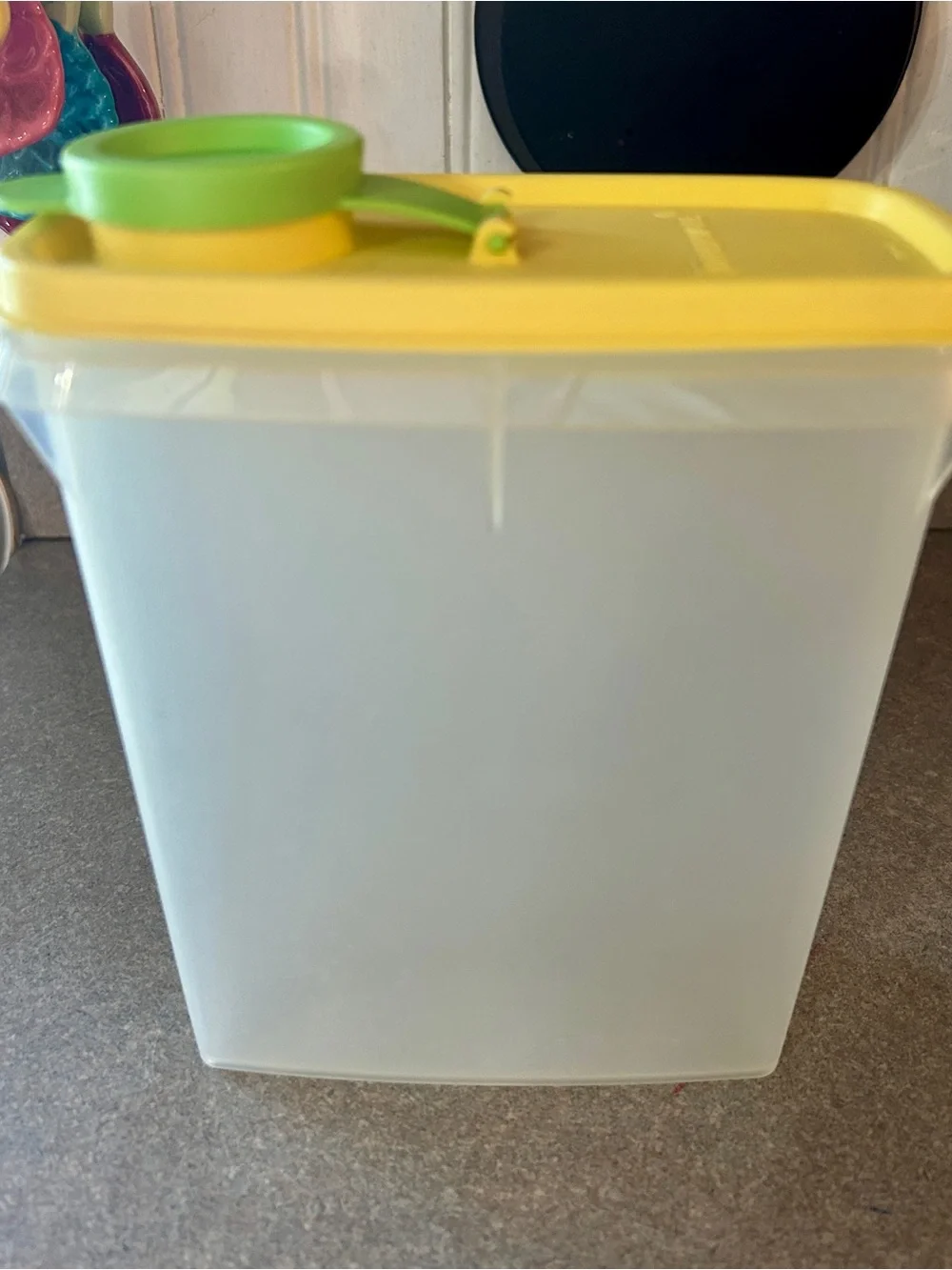 Tupperware Yellow-Lid Dry Goods Container with Green Scoop